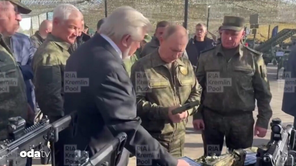 silahi eline aldi sarjoru doldurdu putin kamuflajlari giydi IFenUTUY